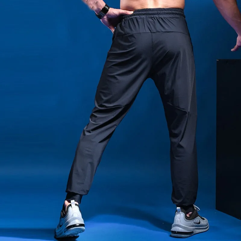 Mens Joggers Casual Pants Fitness Men Sportswear Tracksuit Bottoms Skinny Sweatpants Trousers Gyms Casual Elastic Pants