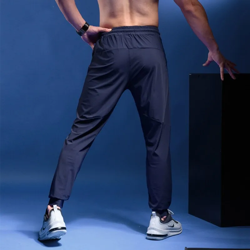 Mens Joggers Casual Pants Fitness Men Sportswear Tracksuit Bottoms Skinny Sweatpants Trousers Gyms Casual Elastic Pants